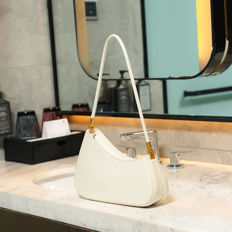 Women's retro oval underarm bag in PU leather with single shoulder strap and sandwich pockets