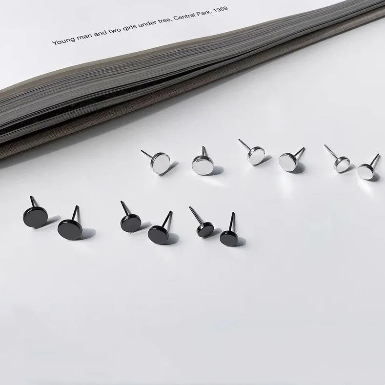 Sterling silver S999 flat ear bone stud earrings with round geometric design in silver and black colours
