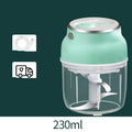 Green portable electric mini garlic cutter masher with transparent cup and USB cable, 150ml capacity on white background