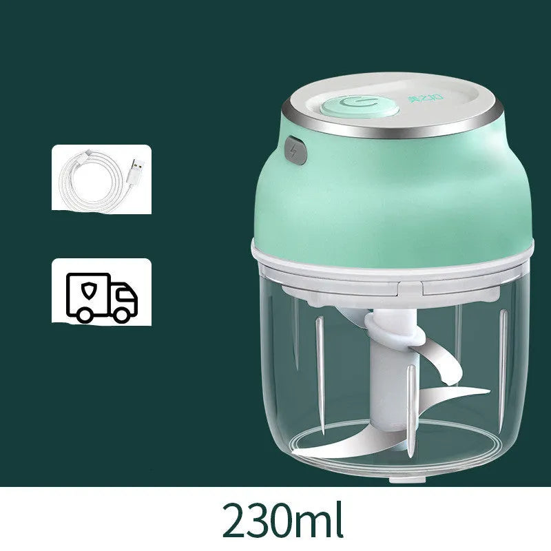 Green portable electric mini garlic cutter masher with transparent cup and USB cable, 150ml capacity on white background