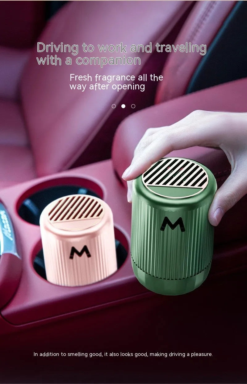 Solid aromatherapy cup for car and home use in choice of four scents, measuring 10 cm by 6 cm.