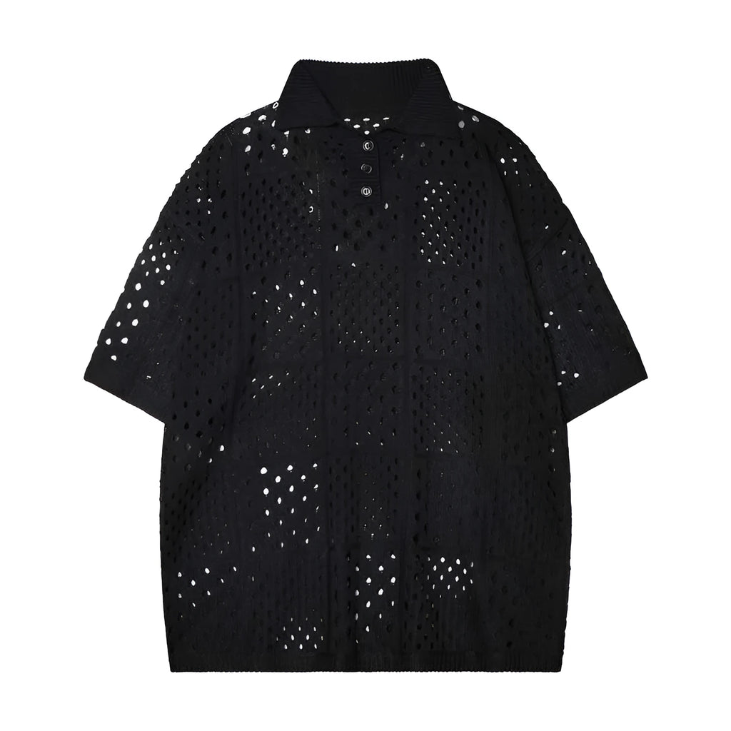 Teenager wearing a solid black loose-fit short-sleeved polo shirt with a hollow knitted texture.