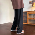Men's jacquard rhombus draped pants in black with straight leg and non-ironing finish