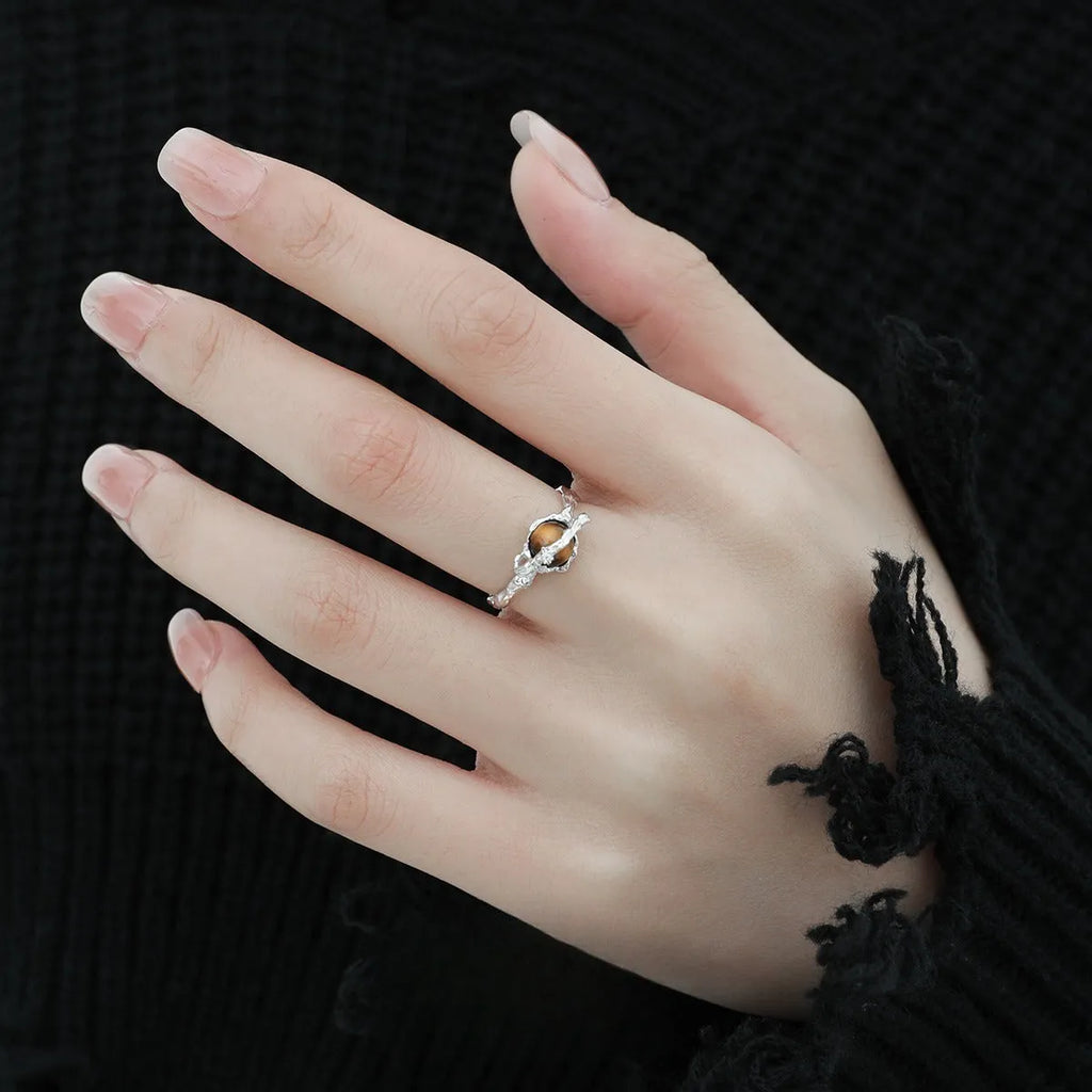 Silver Saturn planetary motif open ring with adjustable size and white gold electroplated finish