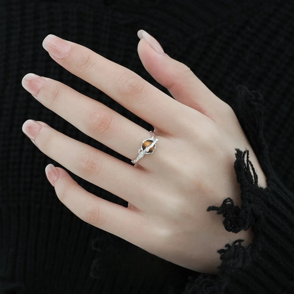 Silver Saturn planetary motif open ring with adjustable size and white gold electroplated finish