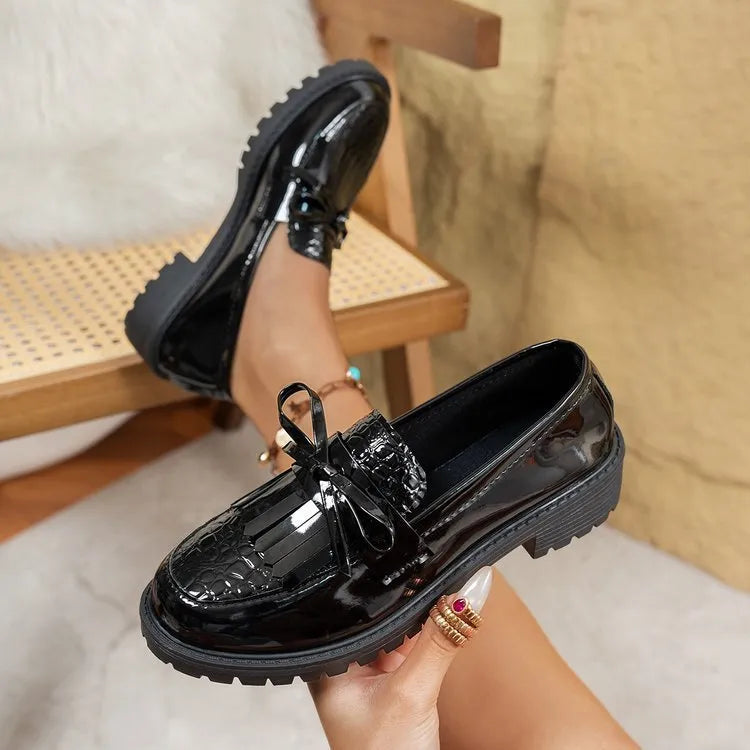 Women's brown loafers with decorative bow on artificial PU leather upper
