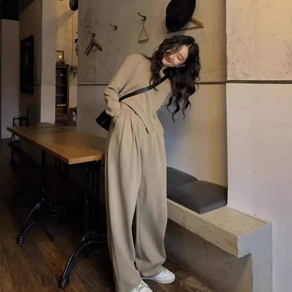 Women's khaki coloured loose-fitting sports suit with long sleeve top and full length trousers