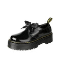 Women's black thick-soled leather shoes with cross straps and ribbon decoration