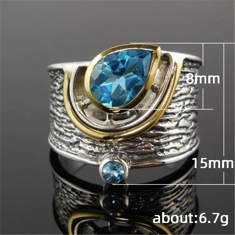Blue zircon Chinese style women's ring with drop shape design and alloy construction