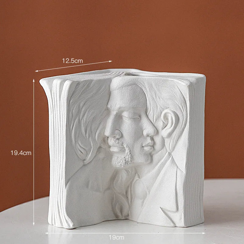 Glazed ceramic book stand in one of four artistic styles: lover, dancer, beauty and beast, or brushed face.