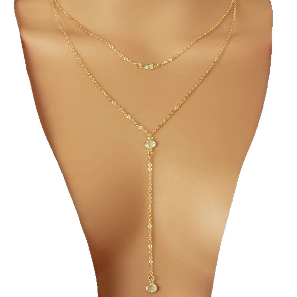Alloy O-ring chain necklace with geometric pendant in gold finish on female neckline