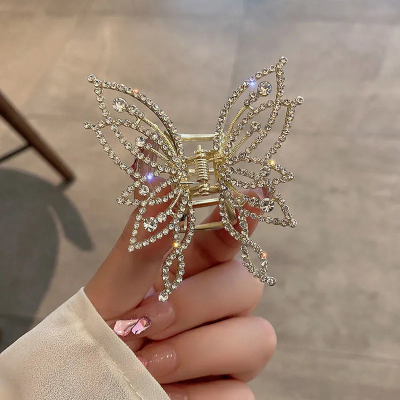 Butterfly-shaped hair clip for women in alloy metal with rhinestone or pearl decorative elements