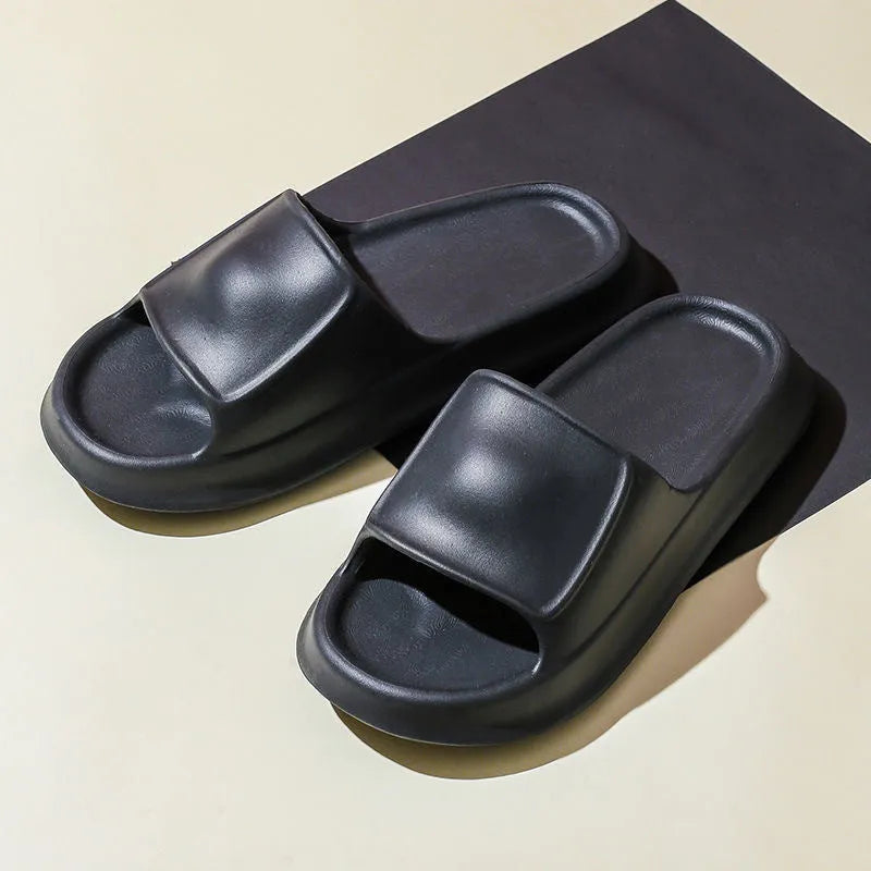 EVA flip-flop slippers with thick sole in multiple colours on a white background