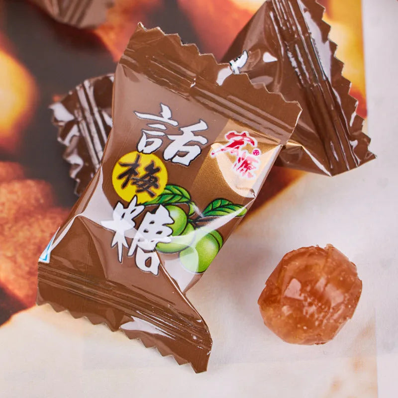 Bag of assorted hard candies: guava, plum, and tangerine peel flavours.