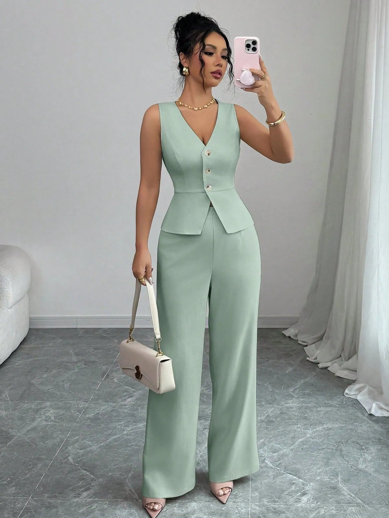 Women's black sleeveless vest and high-waist trousers two-piece casual set