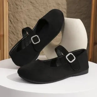 Solid black canvas fisherman shoes with low-top design and rubber sole
