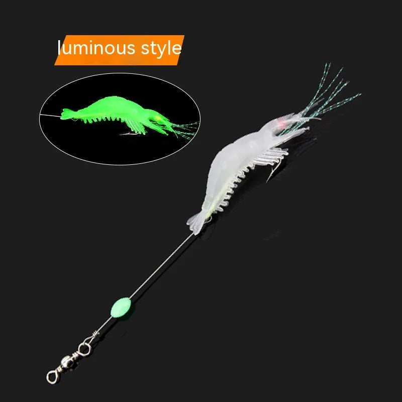 Luer soft fishing lure with metal hook in assorted colours including luminous pink and black head yellow body.