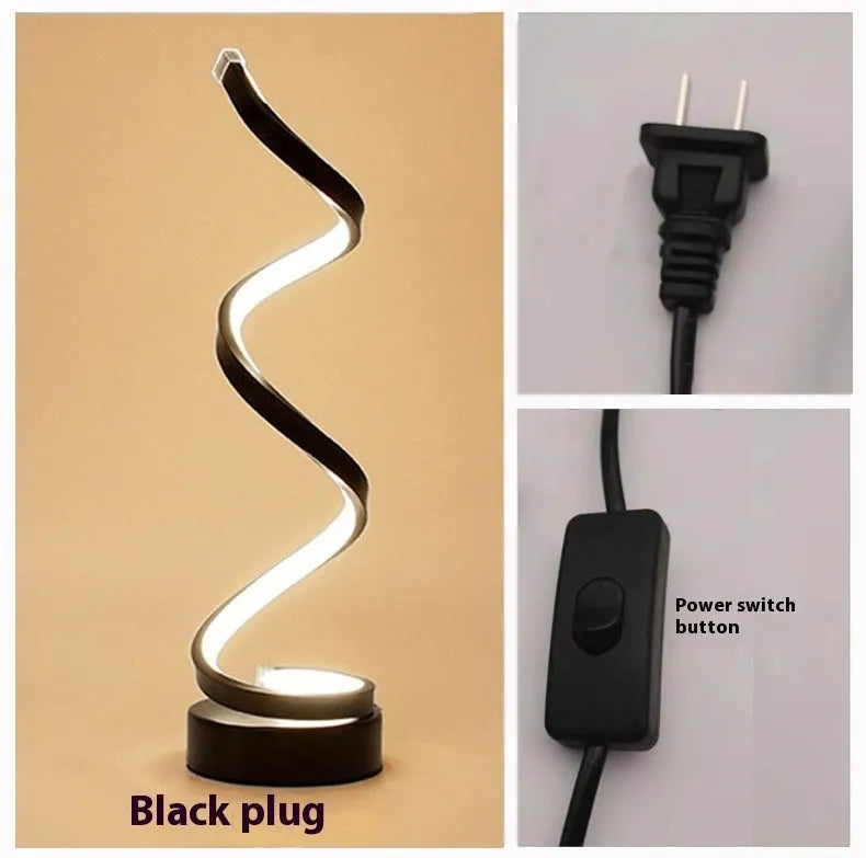 Minimalist black LED table lamp with aluminium shade and tri-colour dimming on wooden bedside table