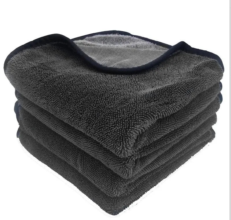 Grey car wash towel with spiral hair texture and contrasting border trim in multiple size options