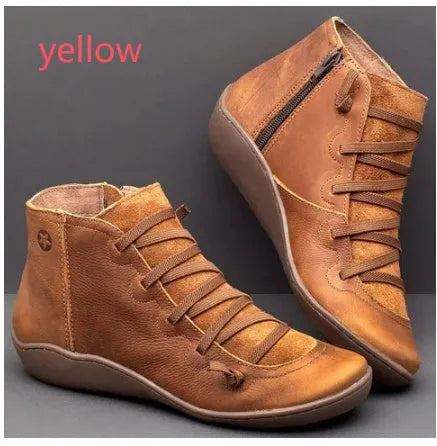 Women's casual ankle booties with a round toe, wedge heel, PU upper, and rubber sole in a selection of colours.