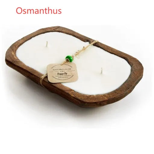 Lavender-coloured wooden basin containing a soy wax aromatherapy candle with three wicks.