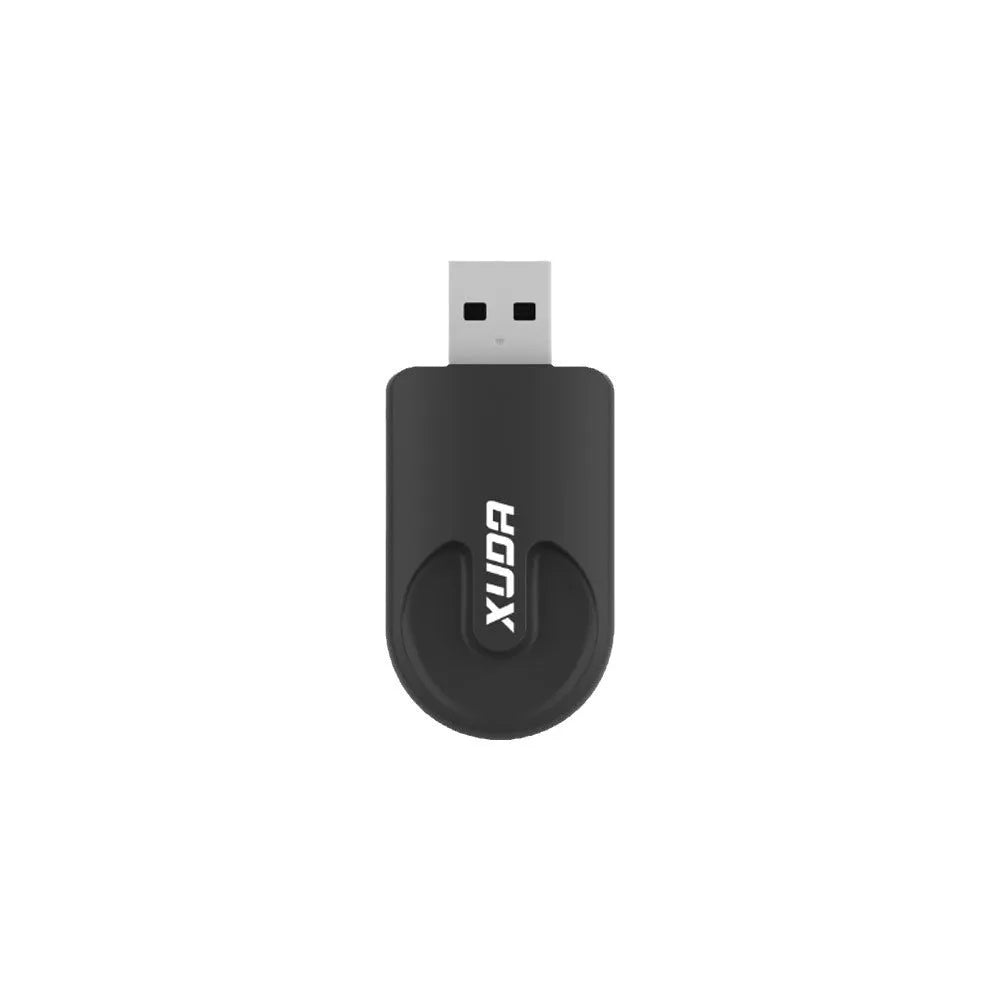 Small black wireless CarPlay USB adapter with compact rectangular design.