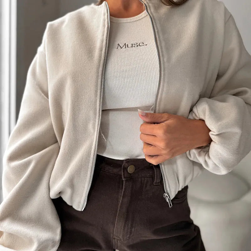Women's off-shoulder short coat with lantern sleeves in milky white colour showing loose casual fit