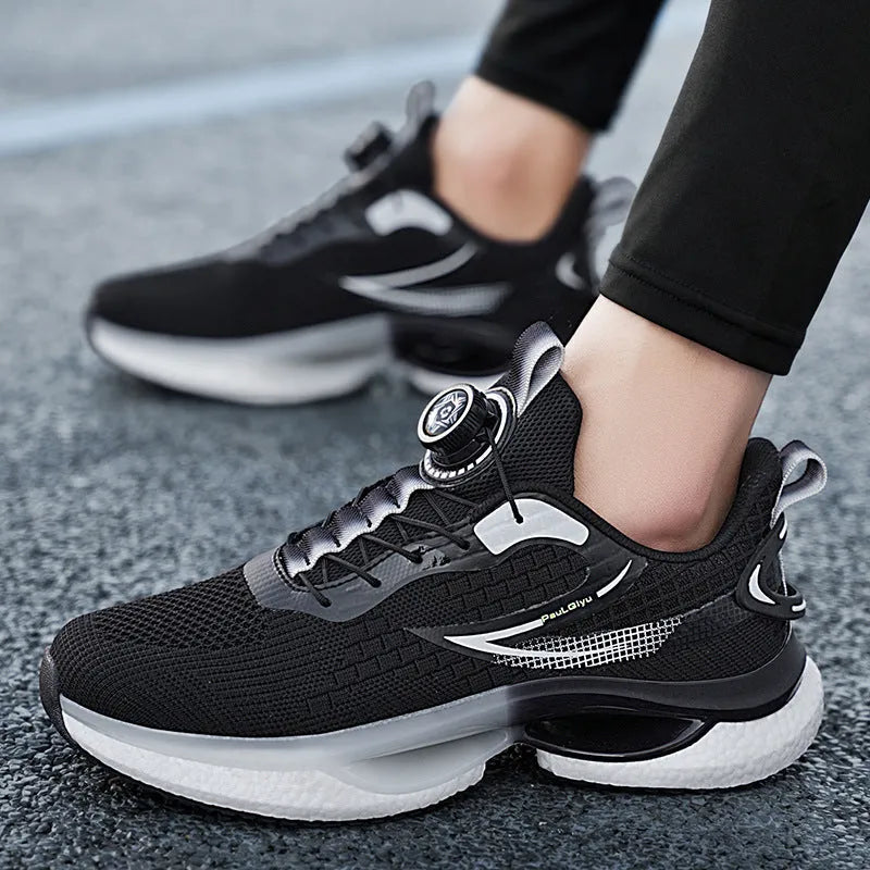 White rotating buckle running shoe with fly-kit mesh upper and low-top design on a solid background.