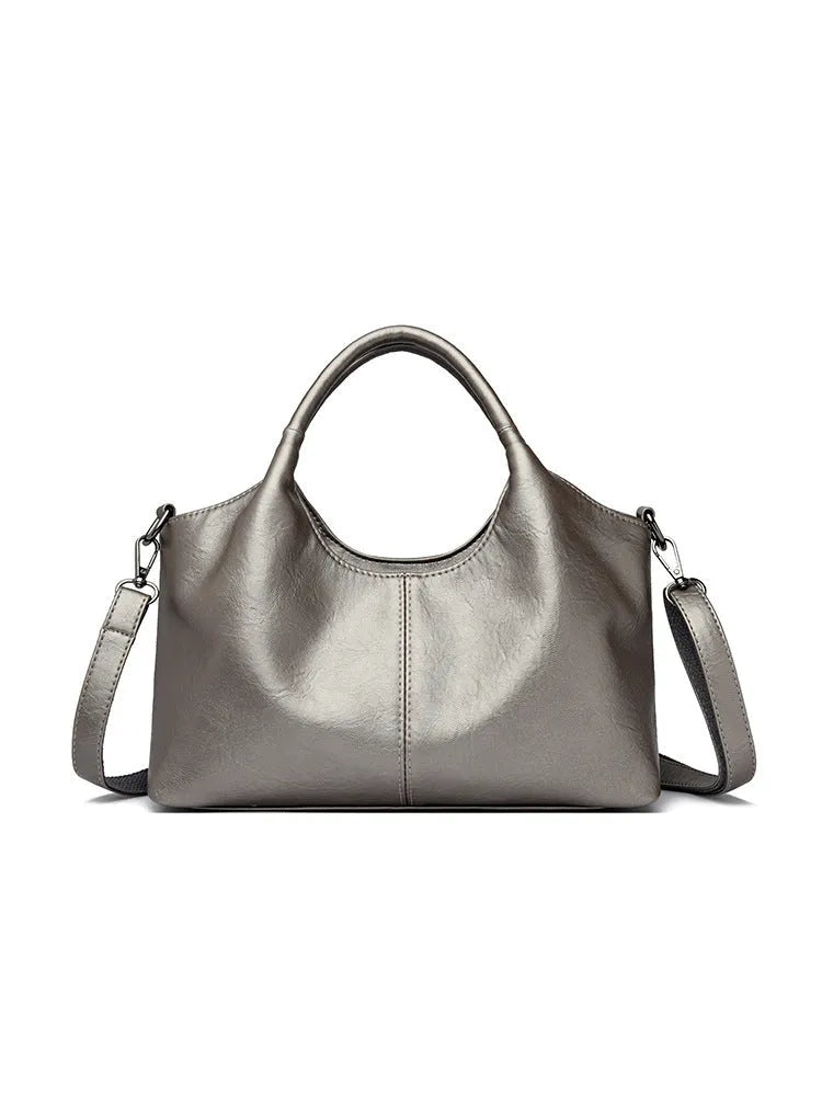 Genuine leather women's cross-body bag in multiple colours showing large capacity design