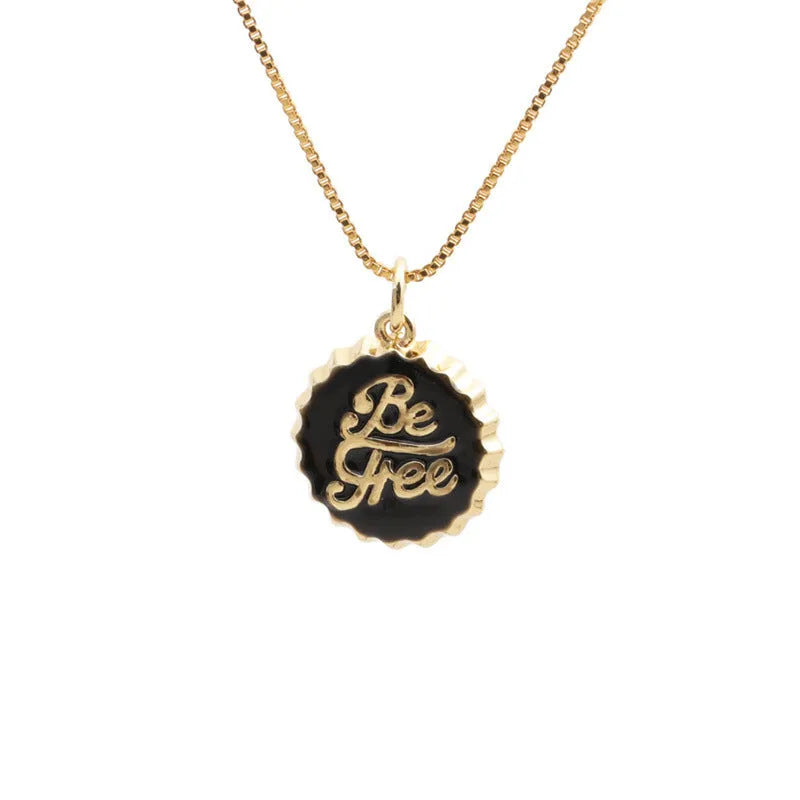 Copper bottle cap pendant necklace on a 40cm box chain with an 18K gold electroplated finish.