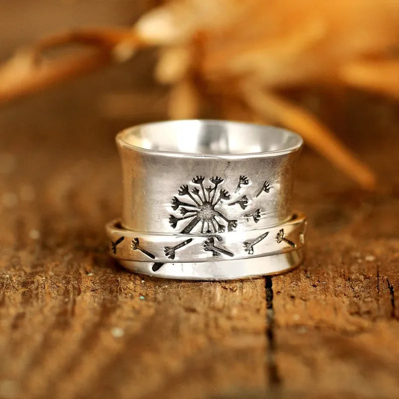 Silver electroplated rotatable flower ring showing adjustable design and flower shape