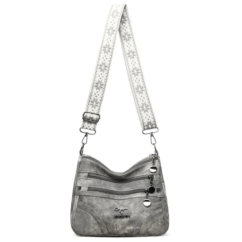 One-shoulder soft leather tote bag in brown with contrast colour details, horizontal square shape