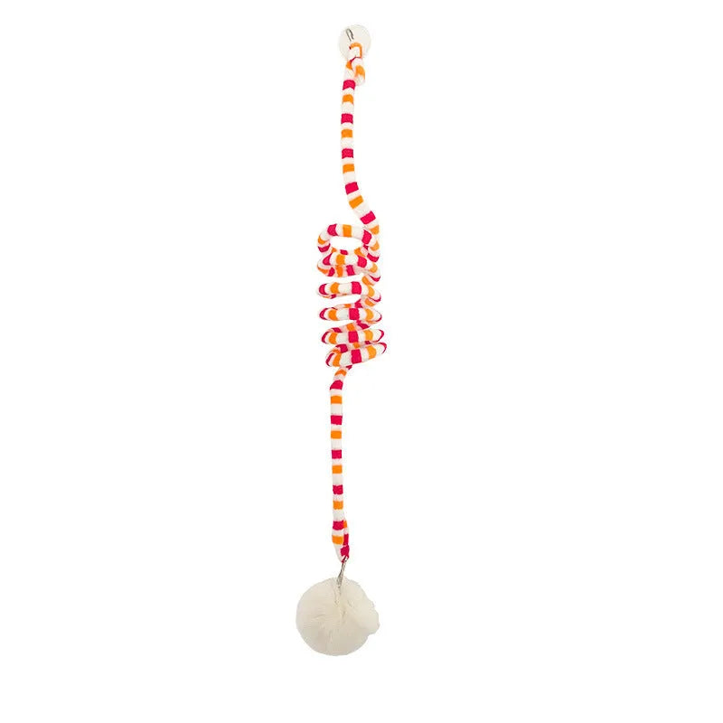 Colourful spring cat toy with hanging bell stick and inflatable ball, shown with a white suction cup.