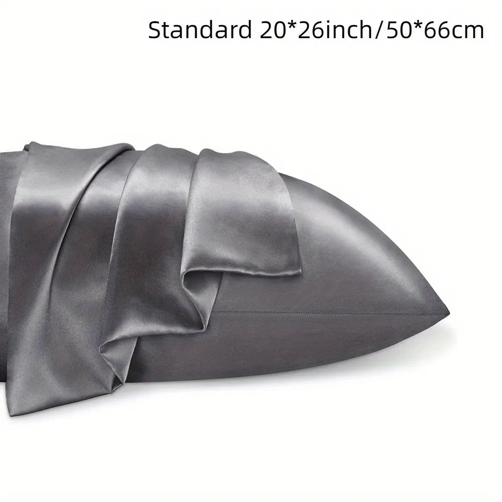 Pair of solid colour satin cloth pillowcases showing colour options including navy blue, wine red and light pink