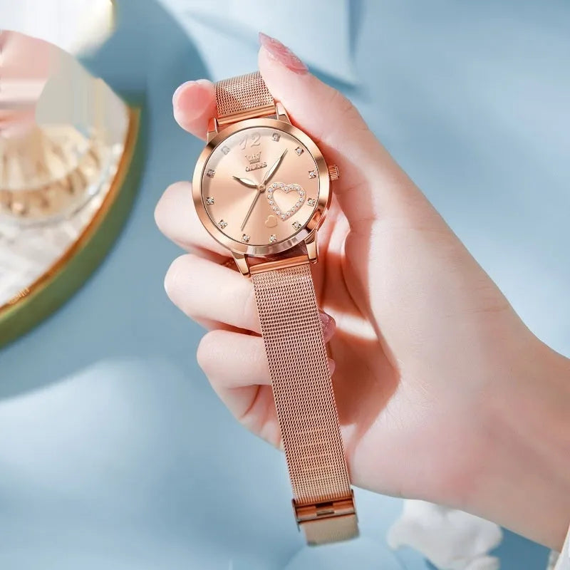 Women's fashion watch with rose alloy case and mesh strap in six dial colour options.