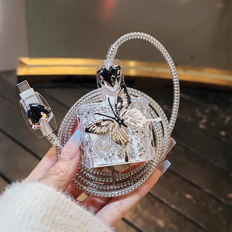 Three-dimensional butterfly USB cable protection sleeve in silver foil for data cable organisation