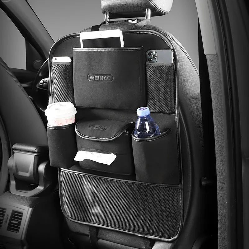 Car seat back storage bag in fleece microfiber, 23.5cm by 13cm, black colour, placed on car seat
