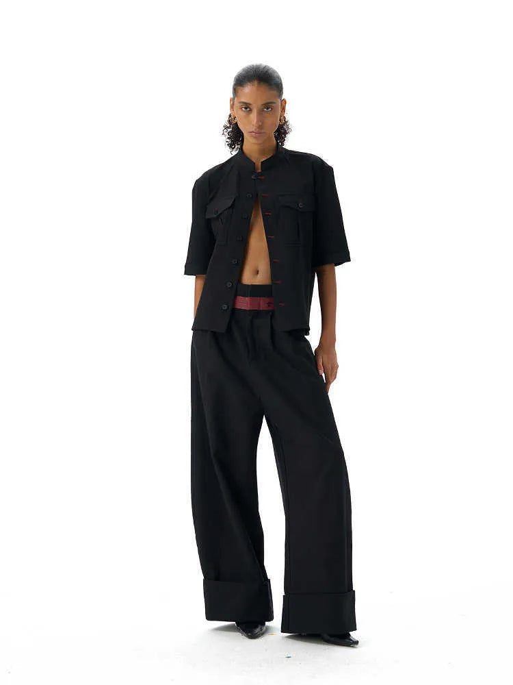 Black loose fit hunting shirt with half sleeves, shirt collar, and single-breasted placket