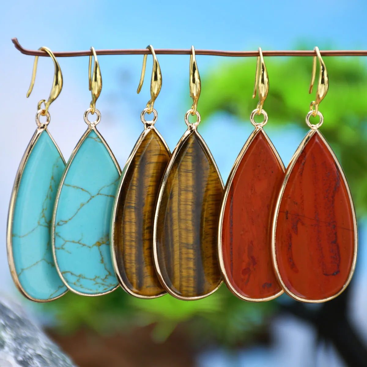 Handcrafted vintage stone water droplet earrings in tigereye, amethyst, pink crystal, redstone and turquoise colours