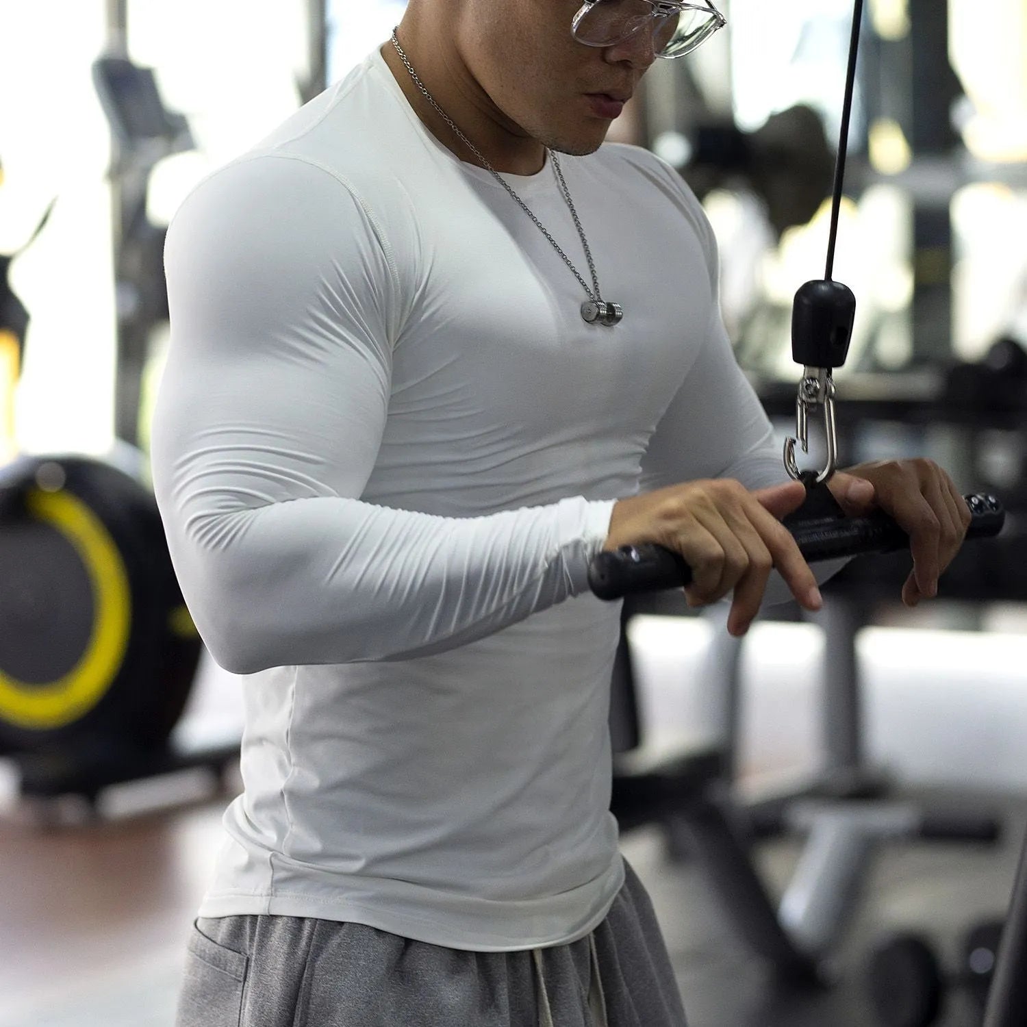 Men's black slim fit long sleeve fitness tights for running and gym workouts