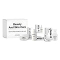 5-piece anti-aging skincare set with firming facial essence, collagen, and vitamin C in bottles