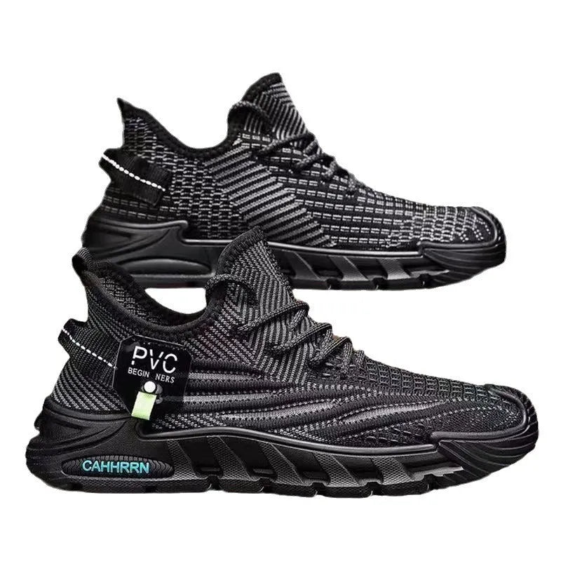 Men's flyknit mesh sneaker in black with thin sole, flat heel, and round toe on a plain background
