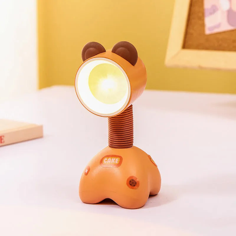 Cartoon animal magnetic night lamp with adjustable head on metallic surface