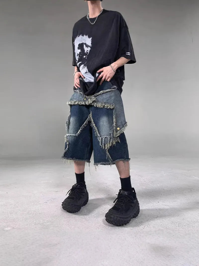 Blue denim shorts with frayed five-pointed star design and loose retro fit