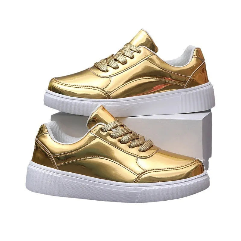 Thick-soled sequin sneakers in metallic rose gold with platform heel and round toe