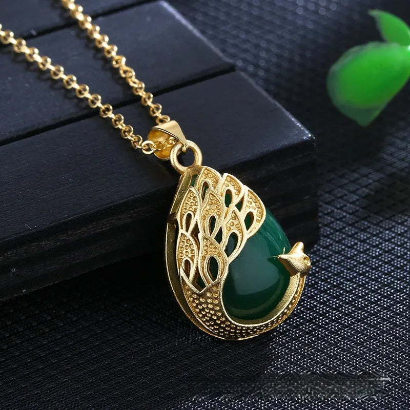 Green chalcedony imitation crystal peacock pendant on copper electroplated base with fu character element